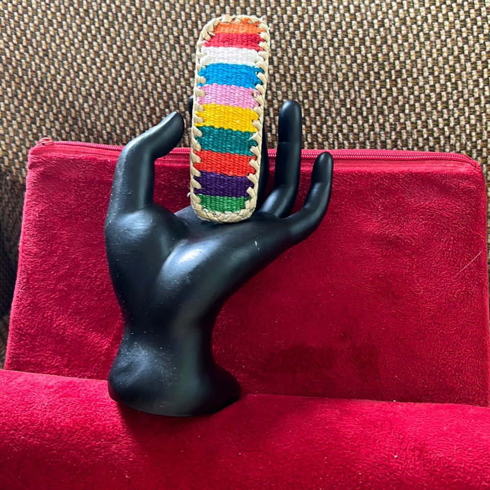 Colorful leather and woven barrette sturdy and looks great in your hair